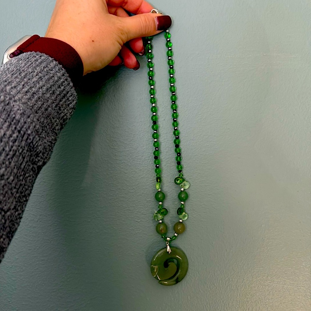 Jade green beaded necklaces with lobster-claw clasp.